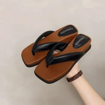 Height-enhancing wedge-heeled flip-flops
